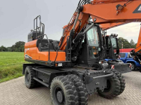 Pelles sur pneus Doosan DX140W-7